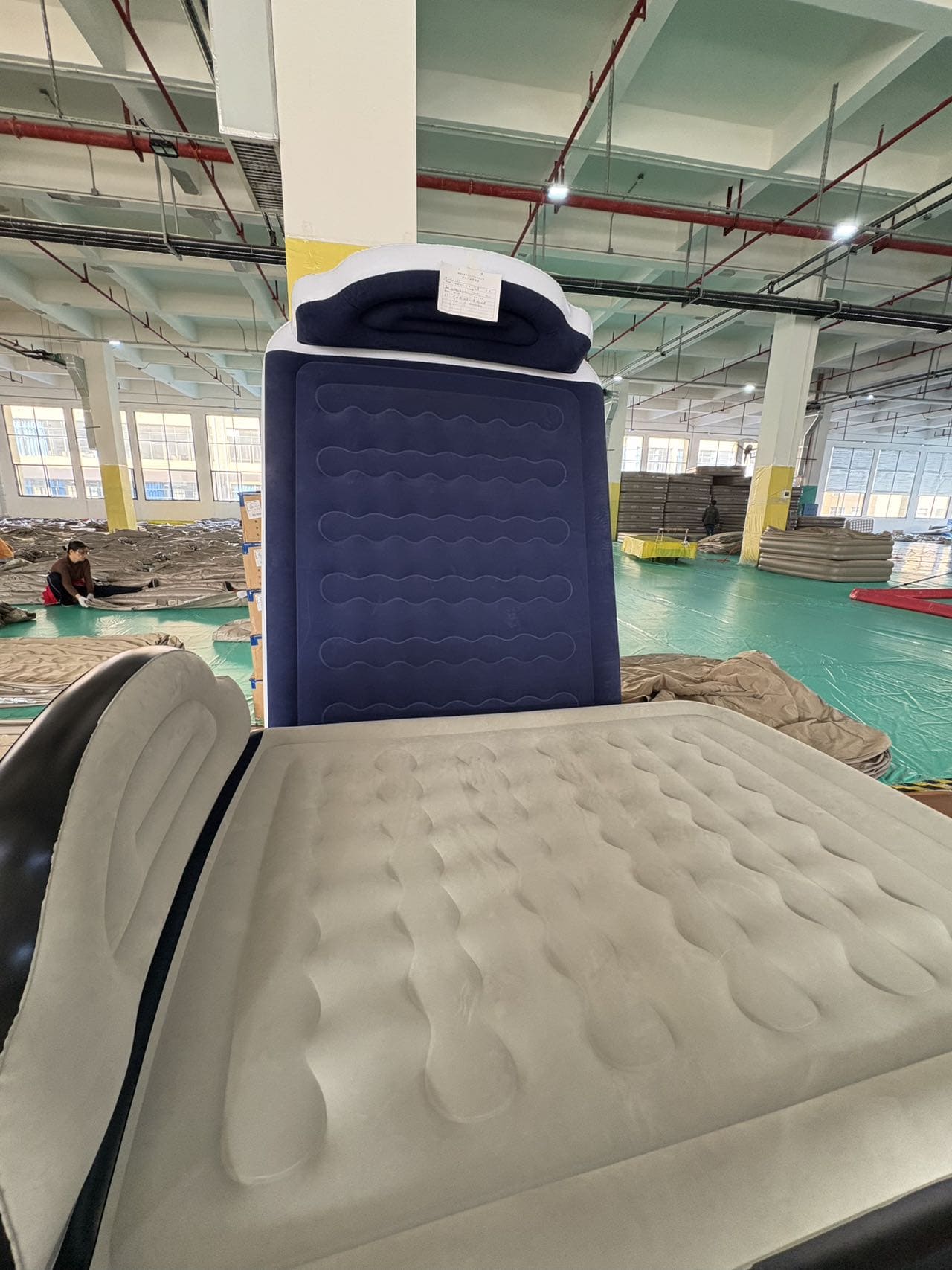 Inflatable air mattresses in a factory production setting